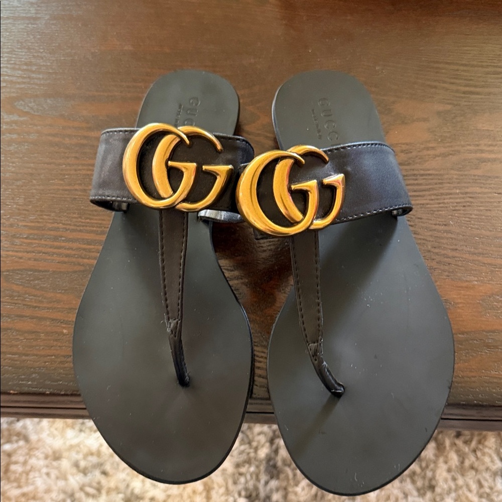 Gucci Black Sandals with Gold Accents